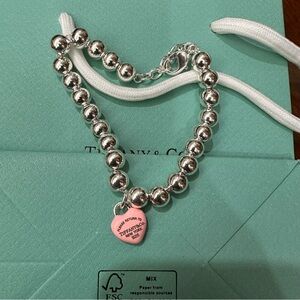 Tiffany & Co. Silver Bead Necklace with Pink Heart Charm